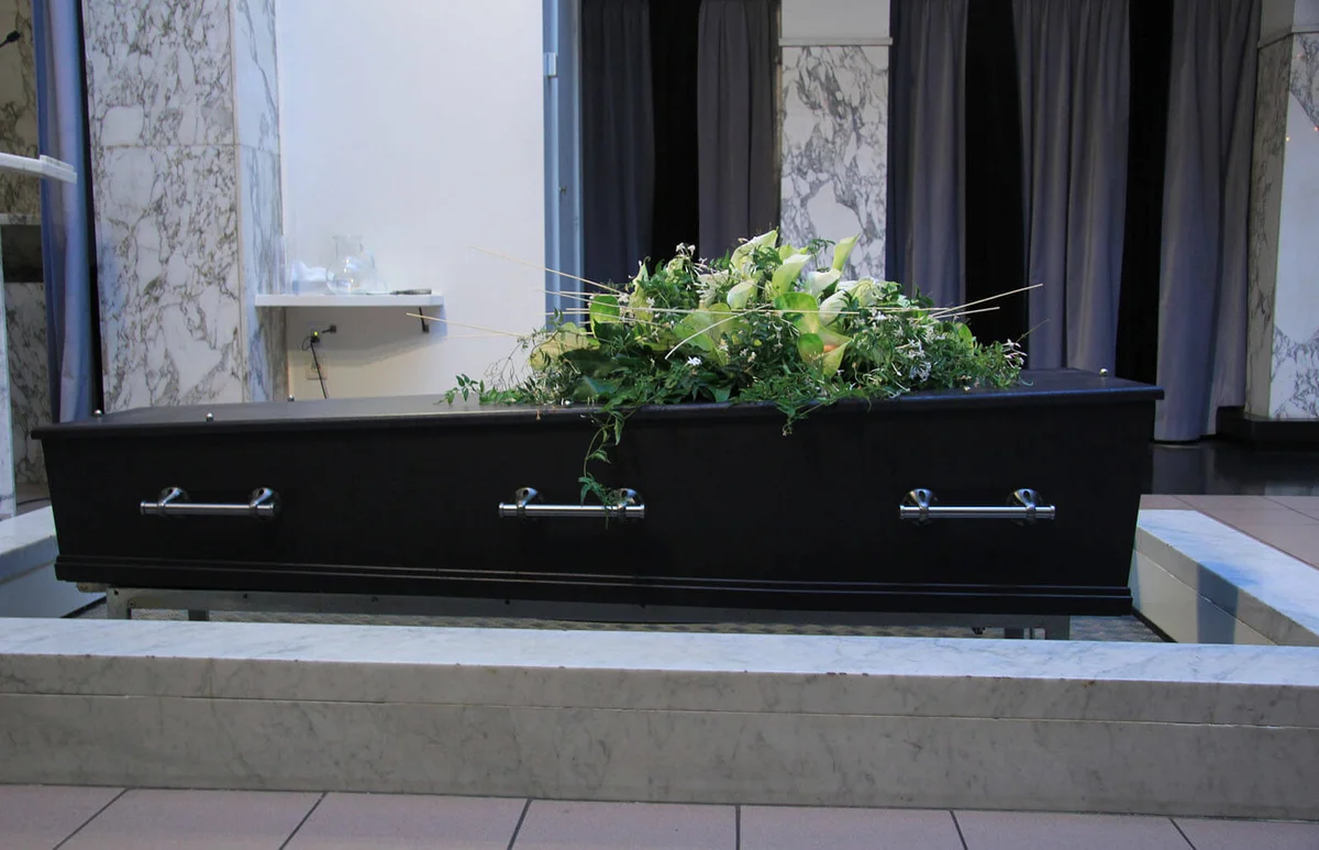 Coffin with funeral flowers
