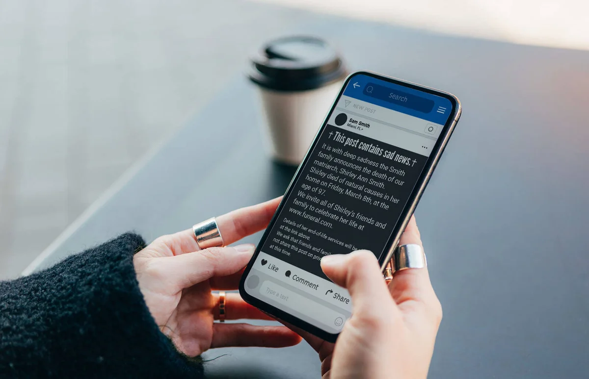 Close up shot of female hands holding mobile phone with a blank screen