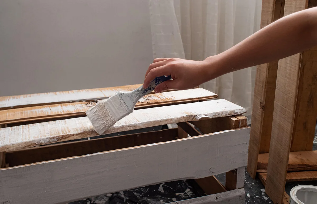 Woman's Hand Painting Wooden Boxes