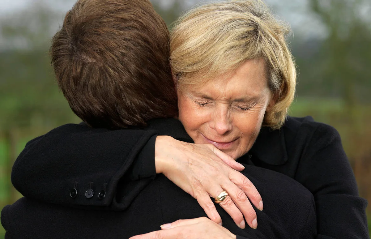Crying Woman Hugging Man