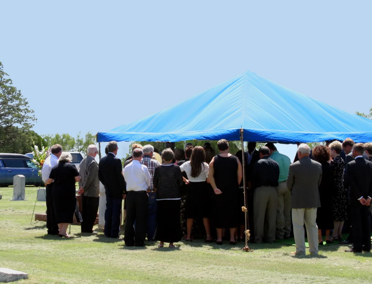 graveside funeral under a tent