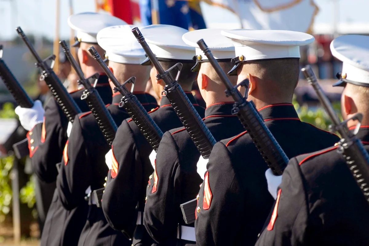 Marine Corp performs the 21-gun salute