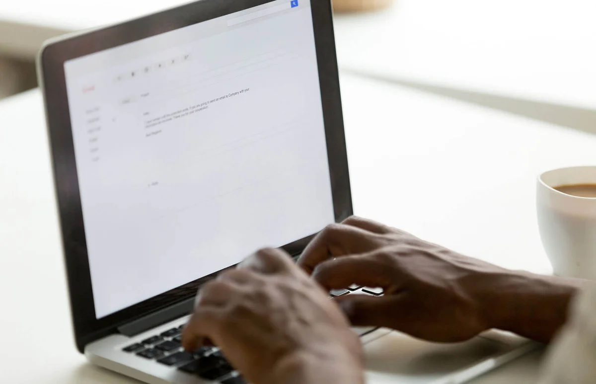 person writing email