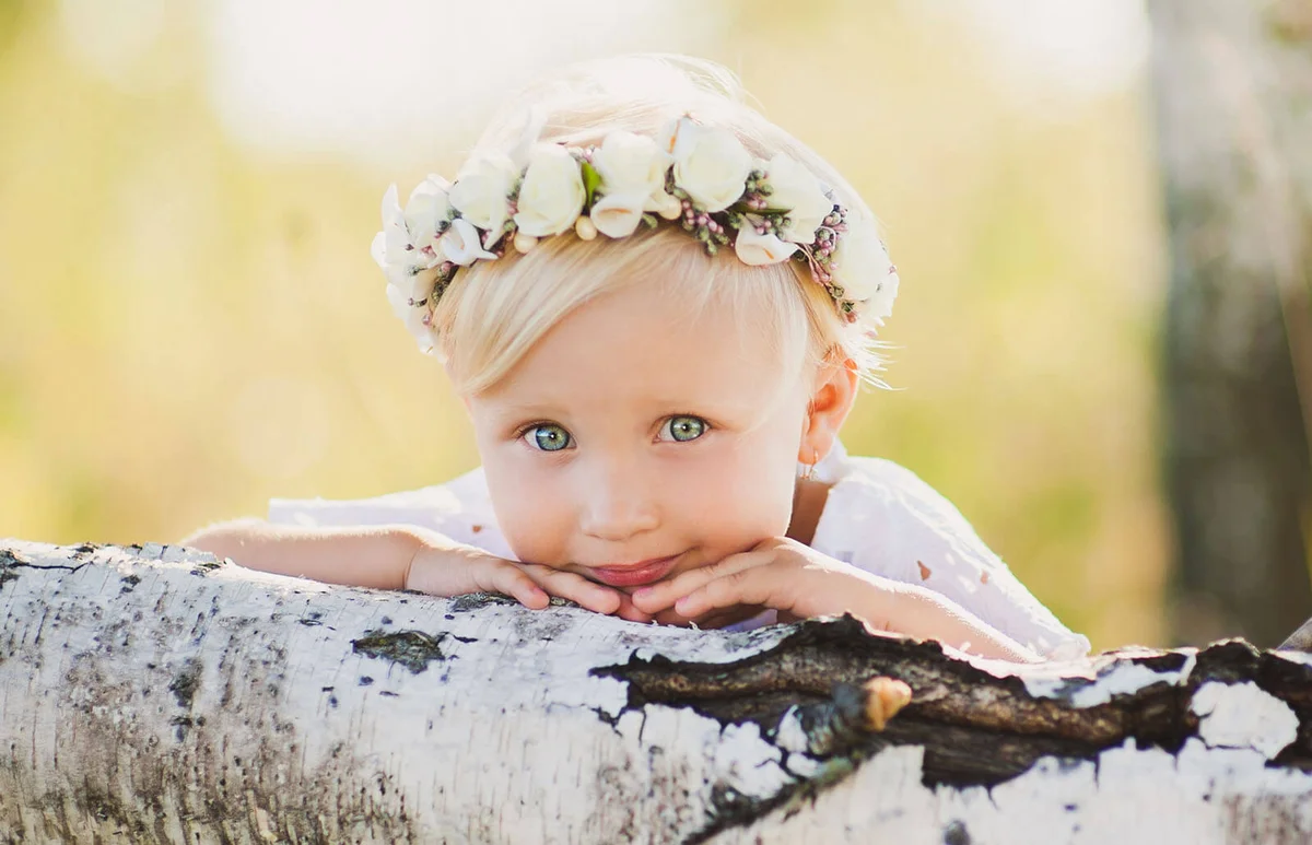 Lovely little baby girl with wreath on her head