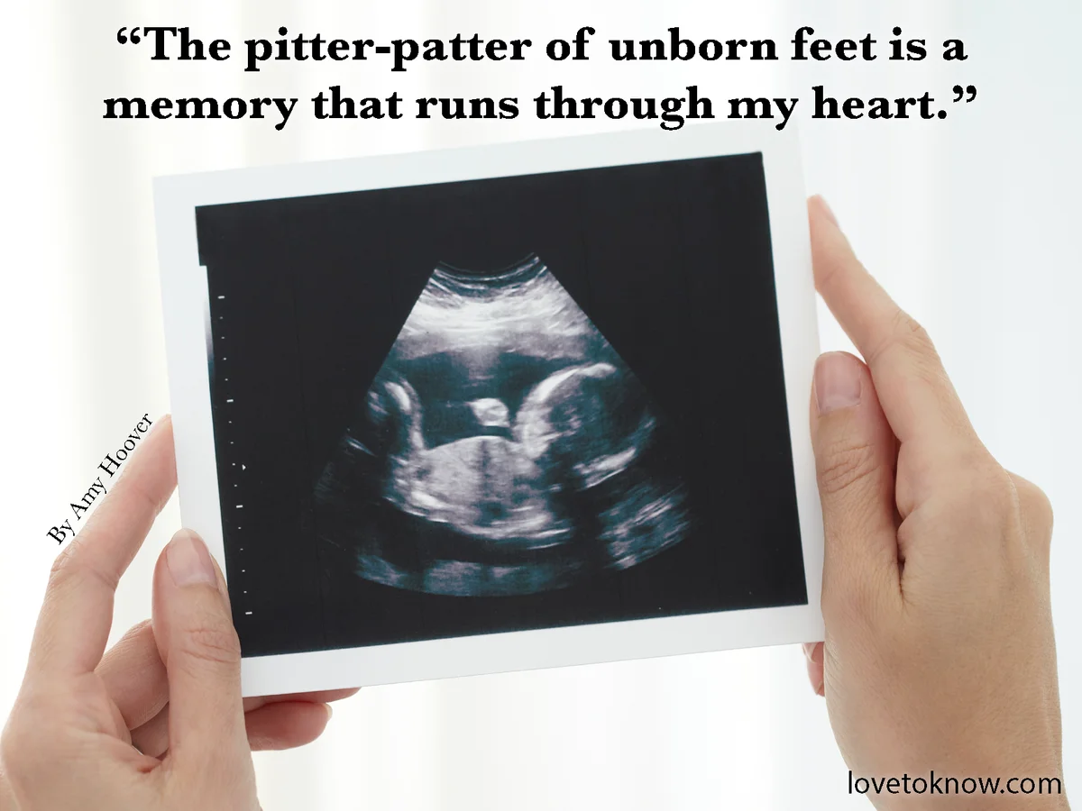 Short Miscarriage Quote With A Woman Holding a Ultrasound