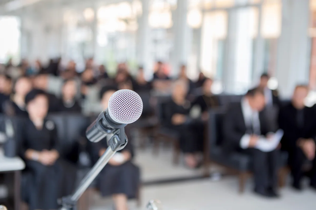 Microphone Against People Sitting In Church