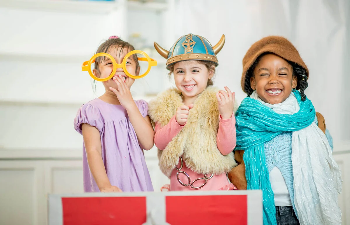 girls playing dress up together