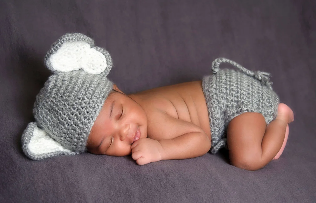 Smiling Newborn Wearing an Elephant Costume