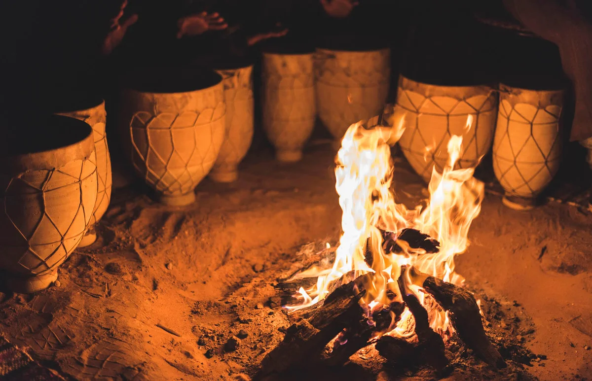 drums next to a bonfire
