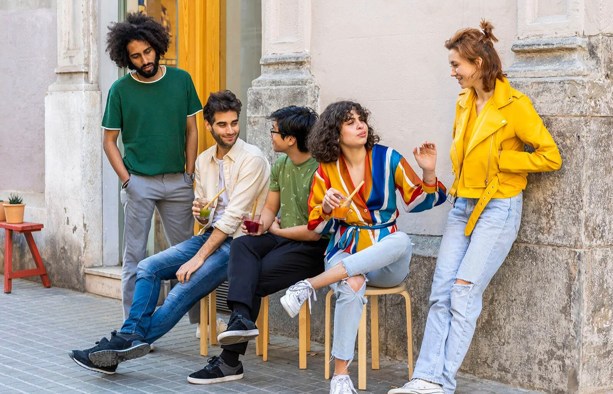 Group of friends having a break in the city