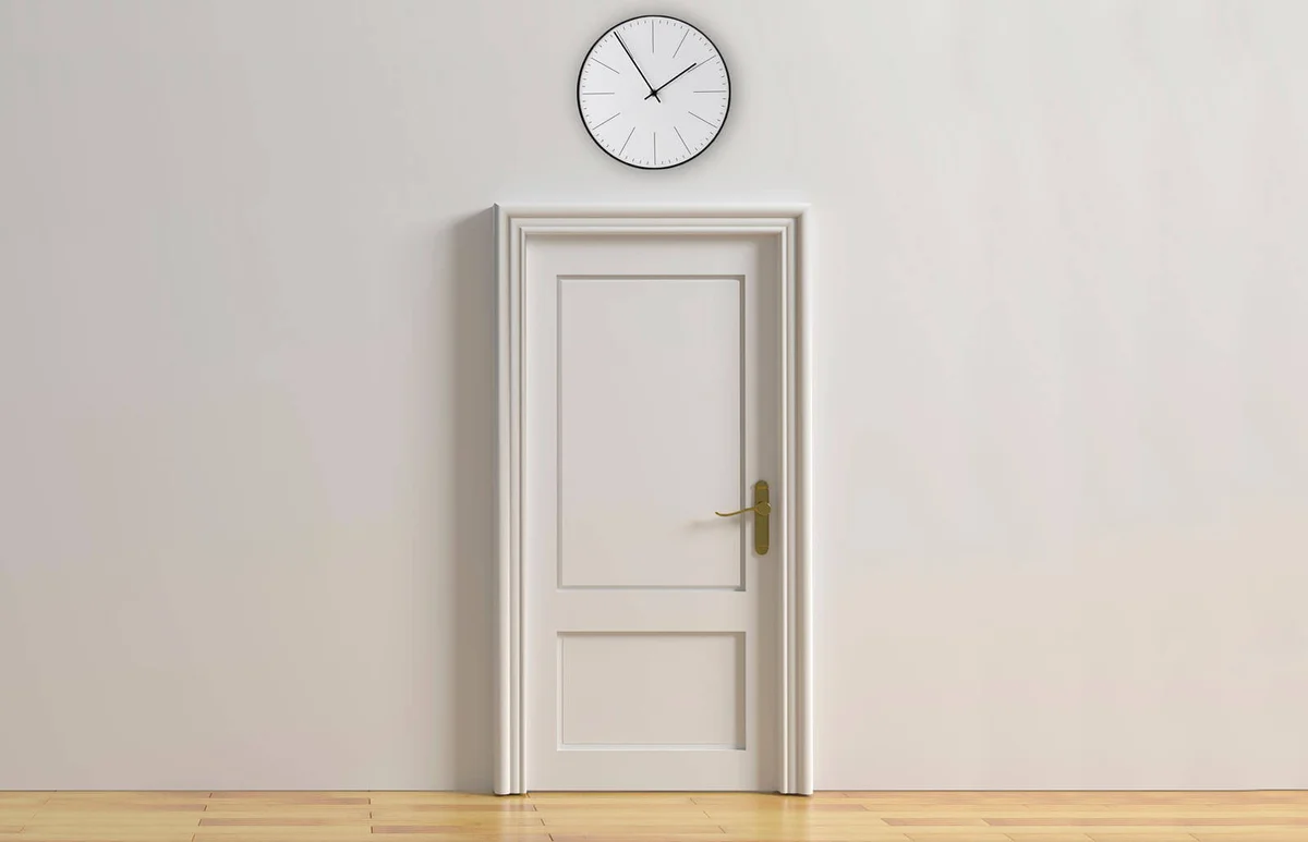 Clock above door