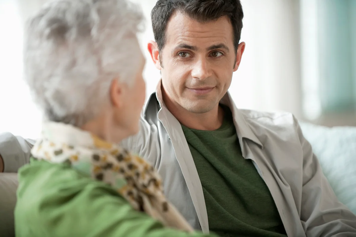 Senior mom receiving sons visit