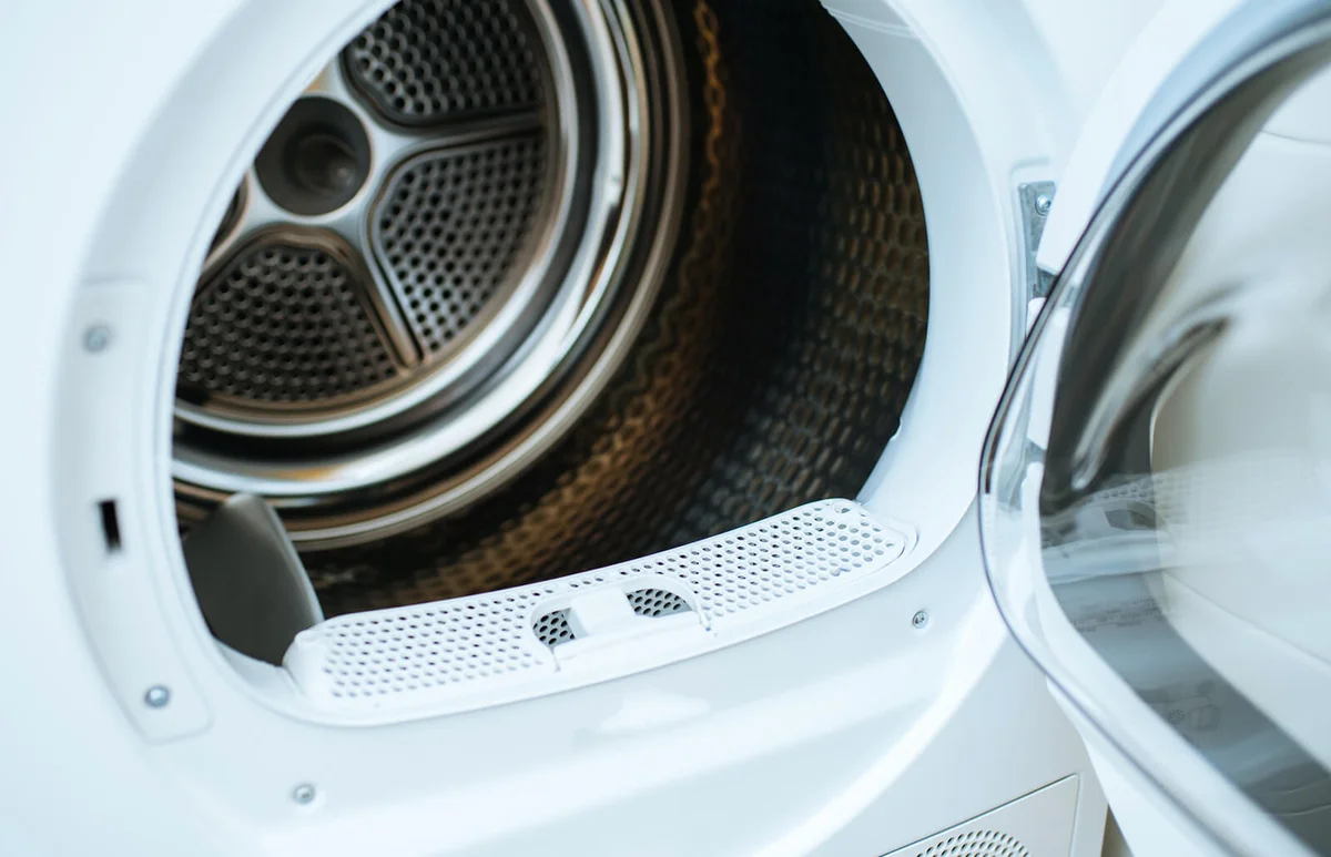 Open door of a modern new front-load clothes dryer