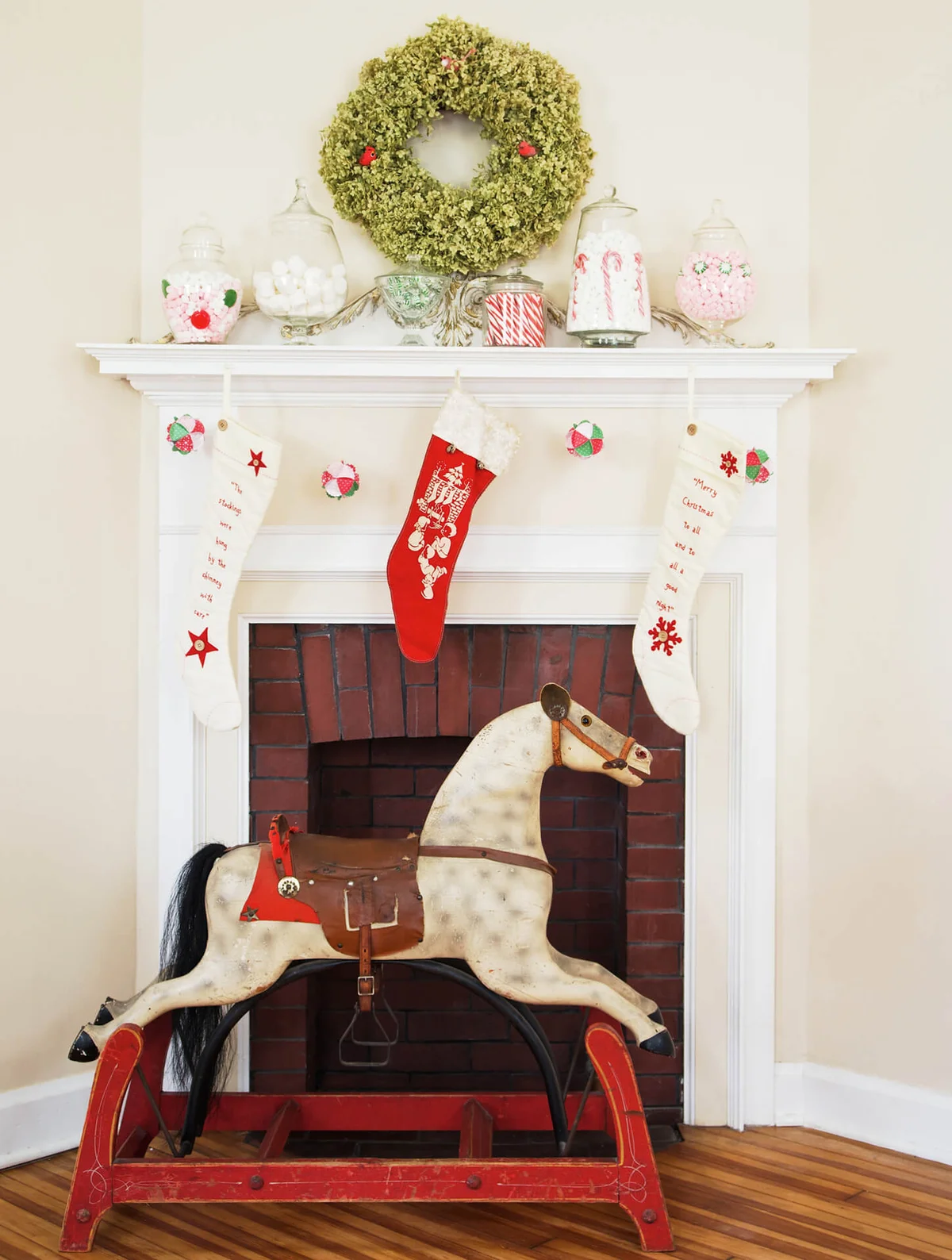 Christmas fireplace display with rocking horse
