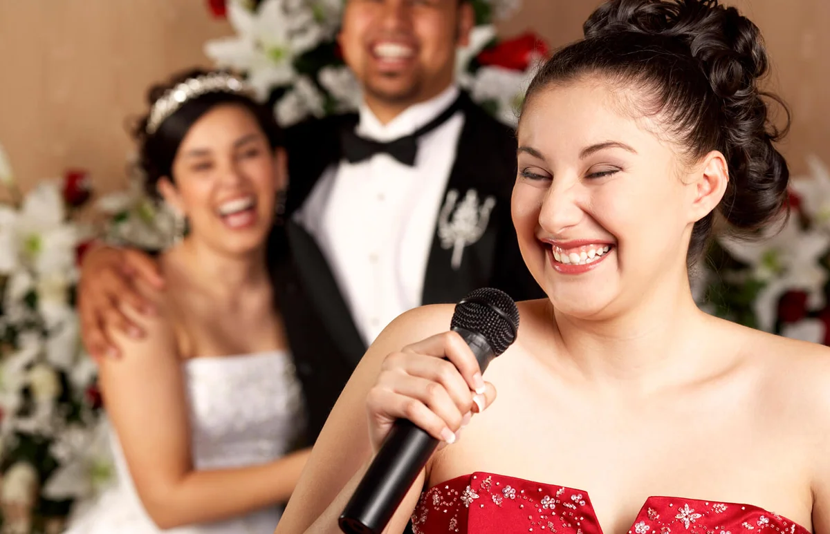 Woman speaking at a wedding reception