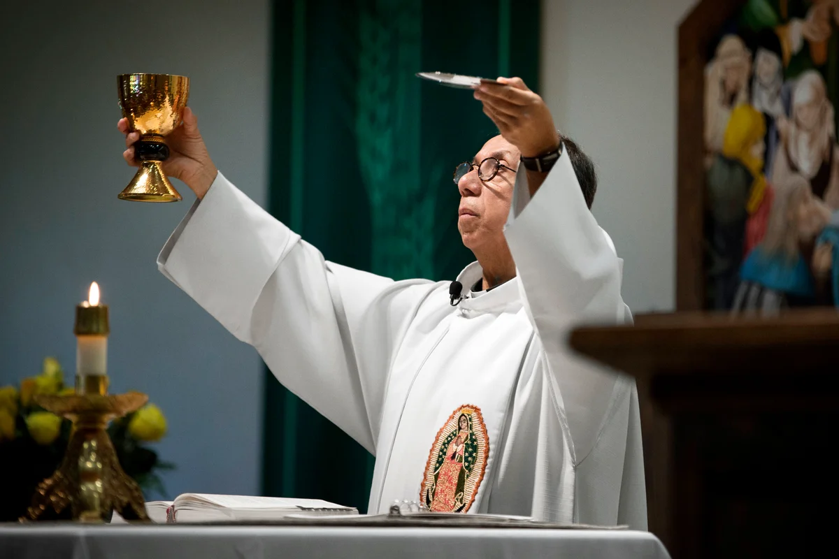 Priest giving sermon in Catholic church