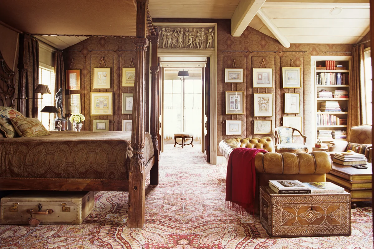 Bedroom with Coordinated Bedding and Fabric-covered Walls