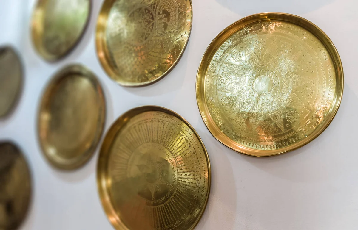 Moroccan copper trays on the wall