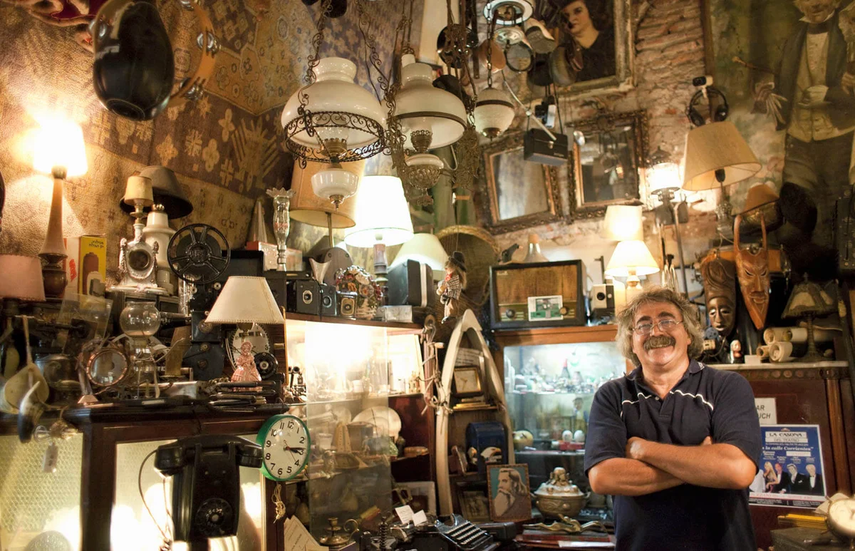 antique store owner in his shop