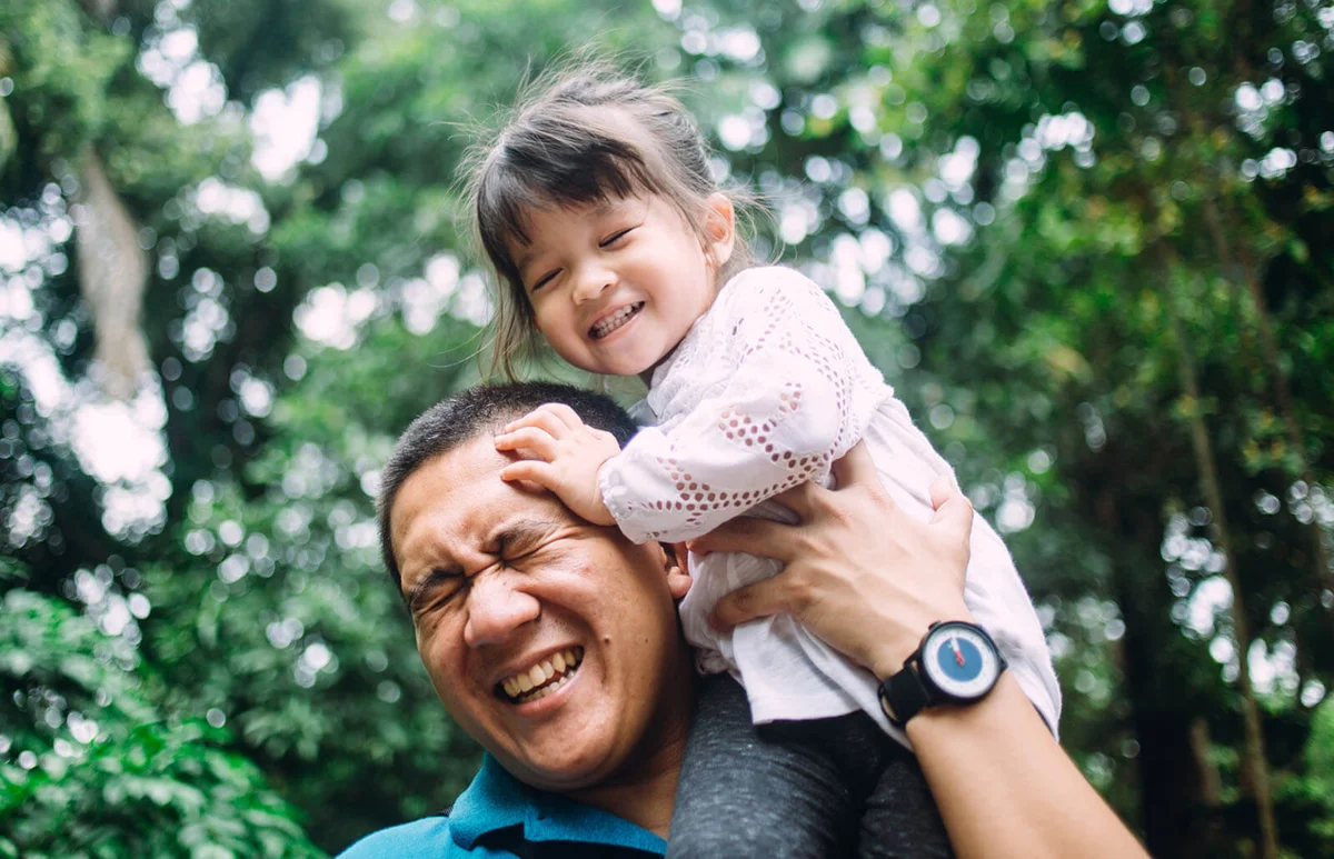 Father playing with daughter