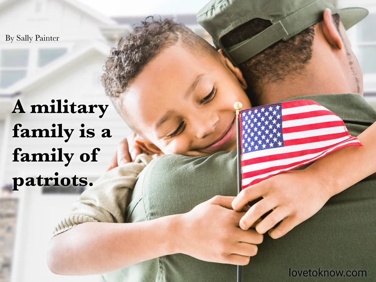 Military man holding his son