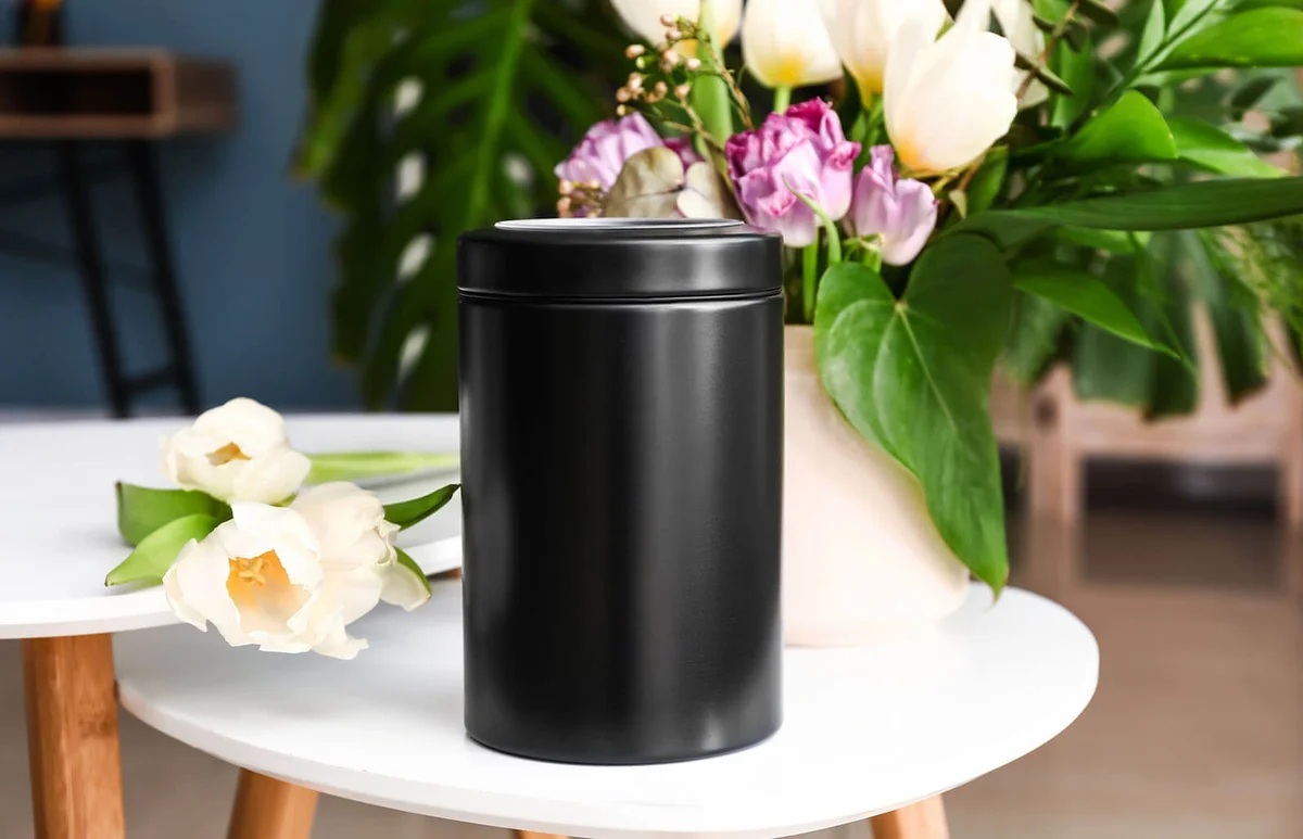 Mortuary urn on table in room