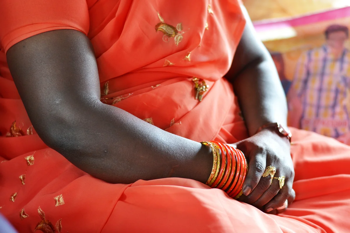 Woman Wearing Red Dare With Bangles