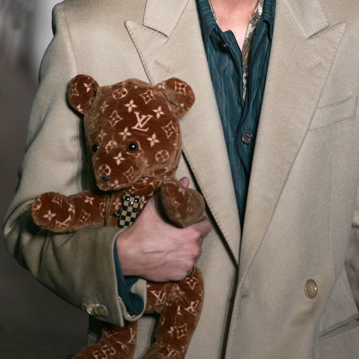 A model displays a creation as part of Louis Vuitton Spring/Summer 2005