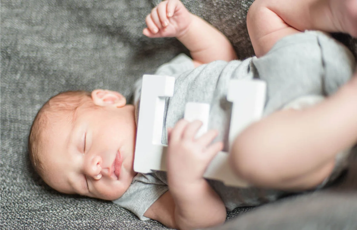 Cute newborn baby serie on grey
