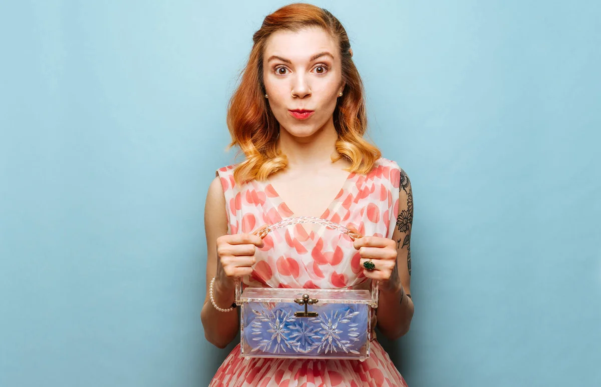 woman with retro dress and purse