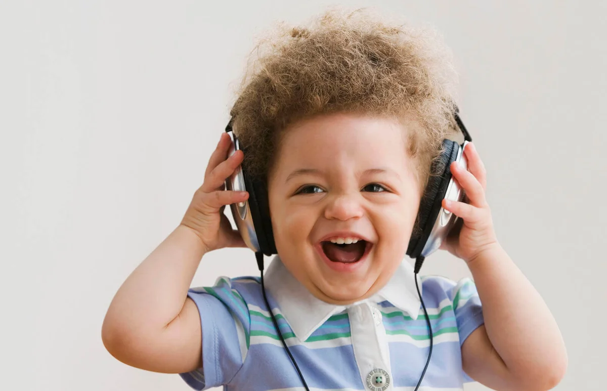 baby listening to headphones