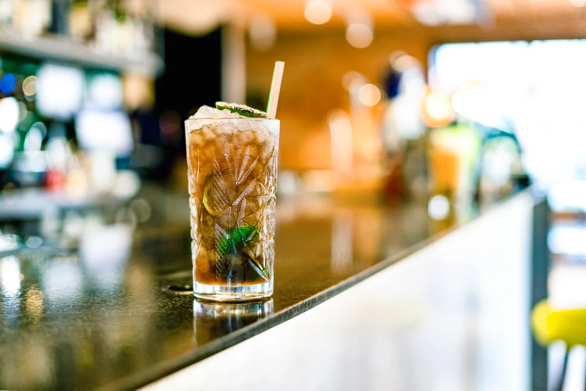 Cocktail on counter of a bar