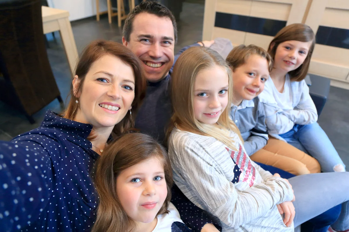 Big blended family taking a selfie