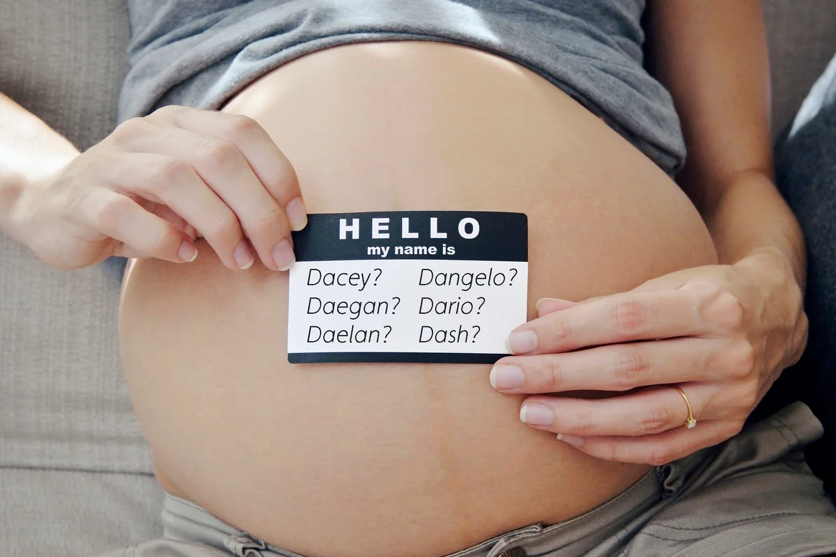 Name tag on a pregnant tummy