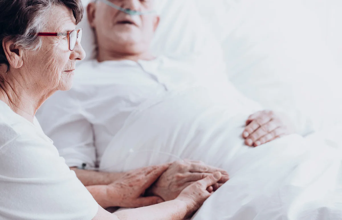 Wife visiting husband at hospital