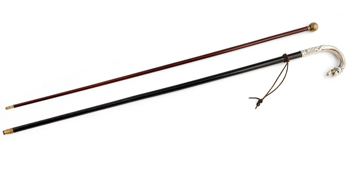 Two walking canes with silver and iron heads from 19th and 20th century