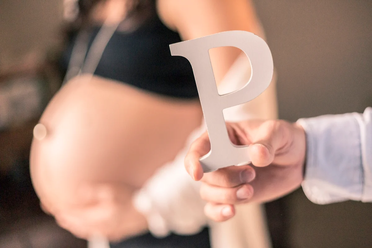 Wood capital letter P for a new born with a baby bump