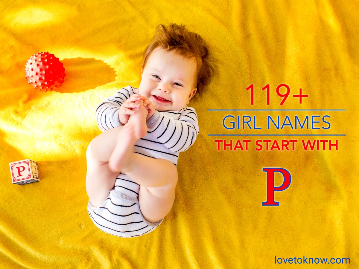 Baby girl playing with blocks on yellow bed
