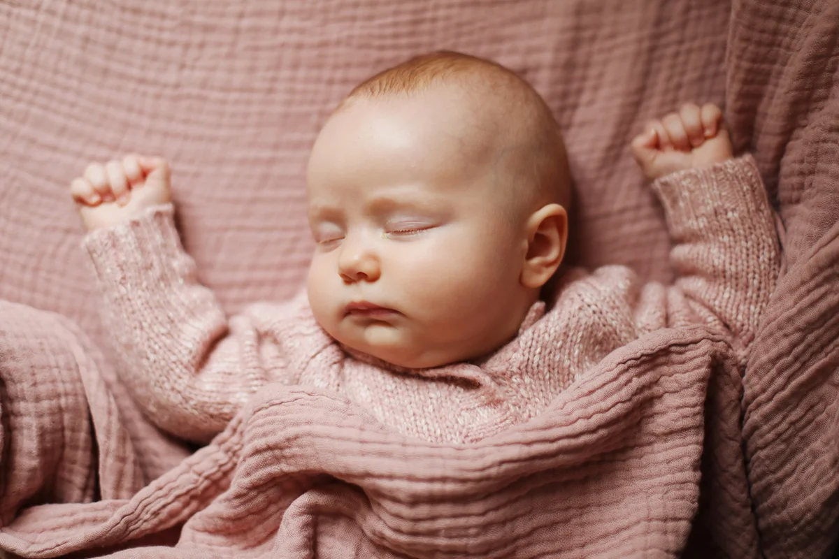 A 4 months old baby girl sleeping
