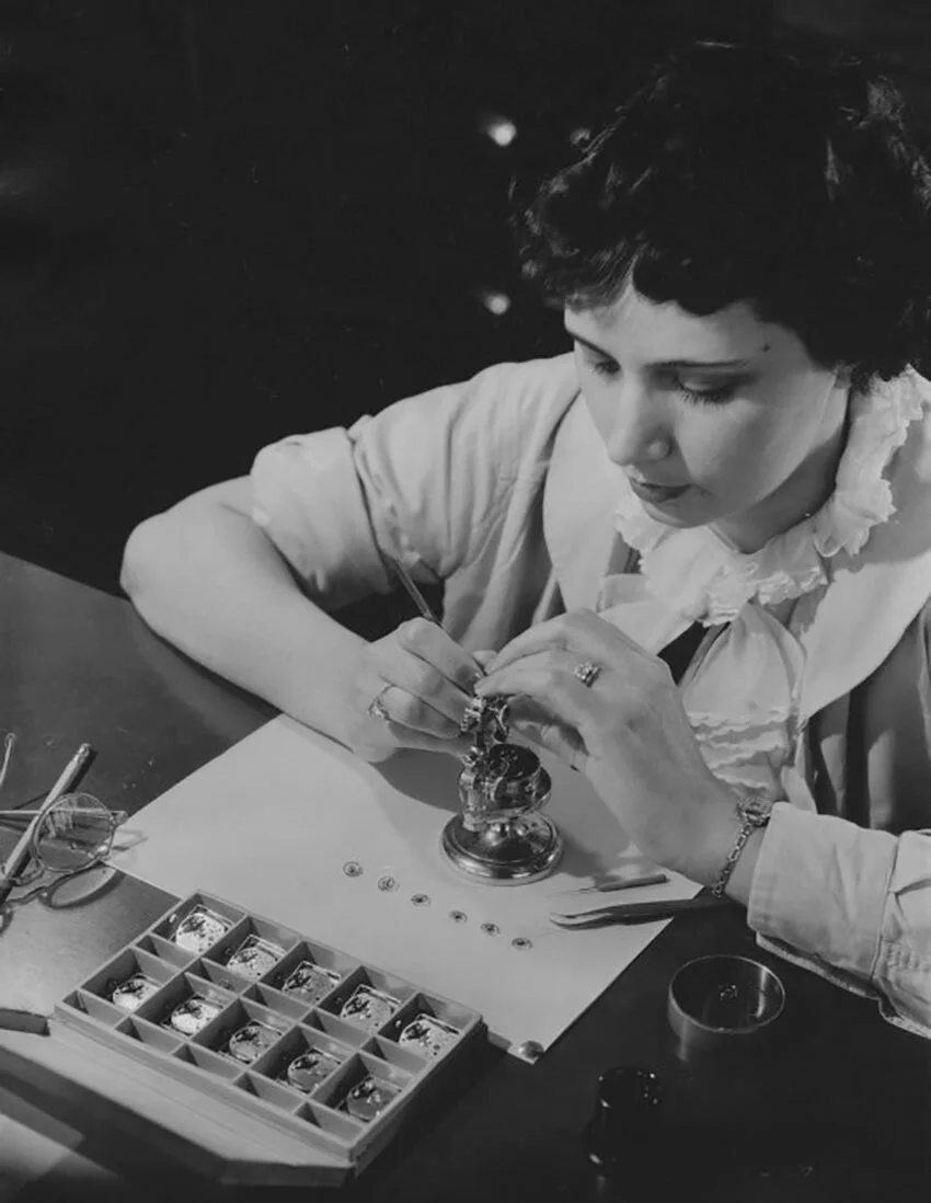 Woman working on a watch at Bulova Watch