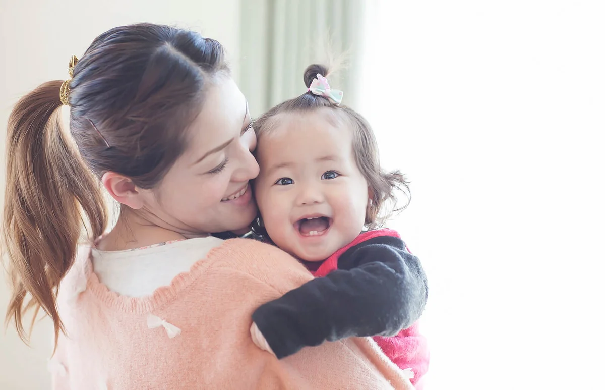 Mother and Smiling Baby Girl