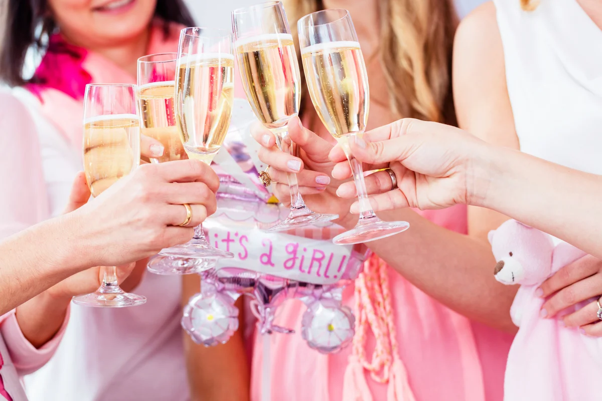 Women Toasting Wineglasses In Baby Shower