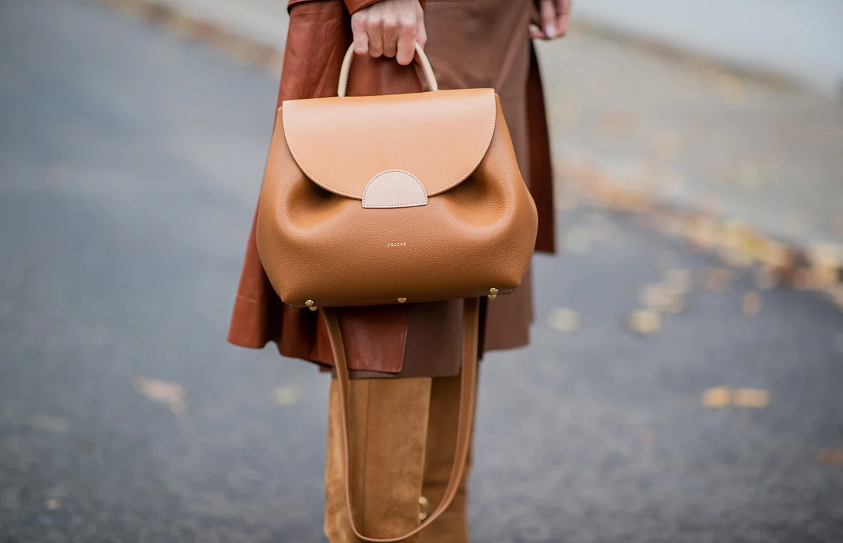 Alexandra Lapp is seen wearing Polène bag in brown | Getty Editorial Use