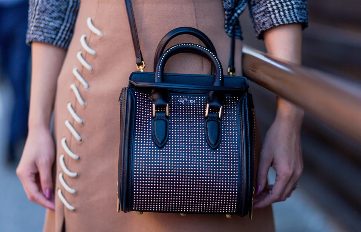 Qing Yang is wearing Alexander McQueen bag | Getty Editorial Use
