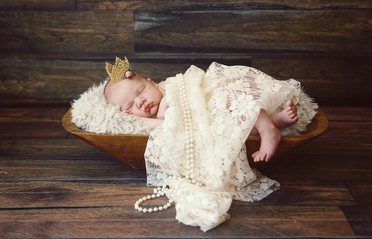Newborn Baby Girl Wearing Crown