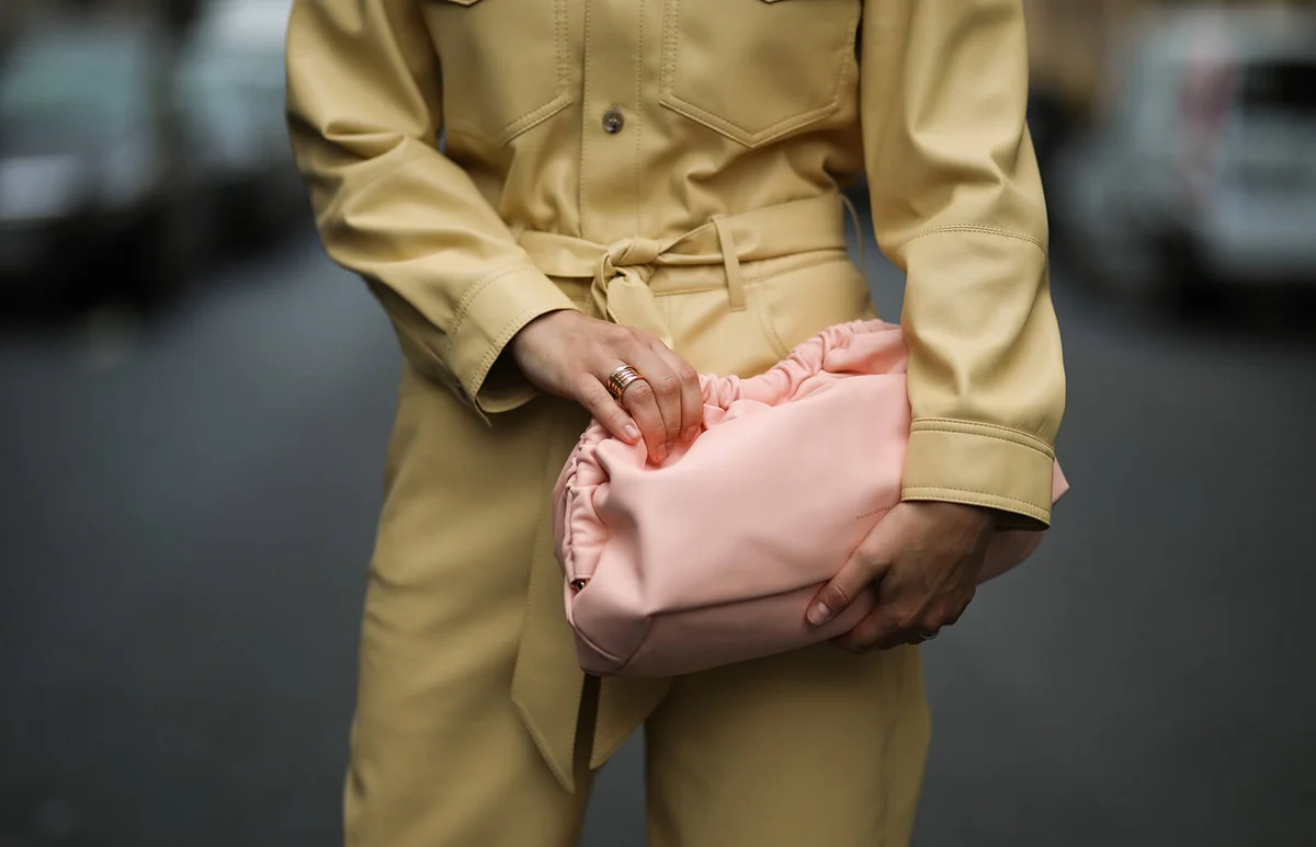 Anna Schürrle wearing rosa Mansur Gavriel bag, yellow Nanushka jumpsuits on September 04, 2020 in Berlin, Germany | Getty Editorial Use