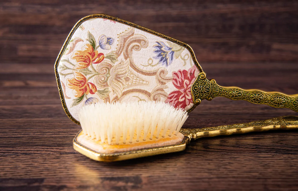 Vintage antique hand mirror and hair brush