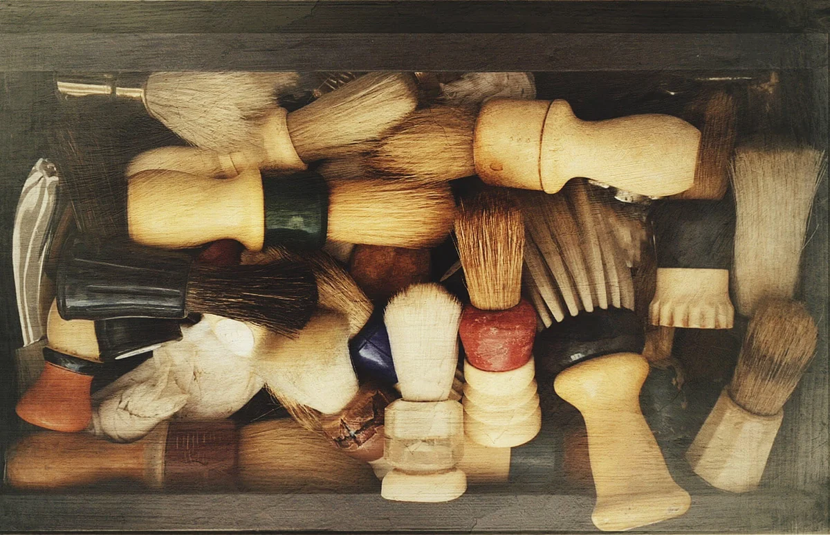 Directly Above View Of Shaving Brushes In Container