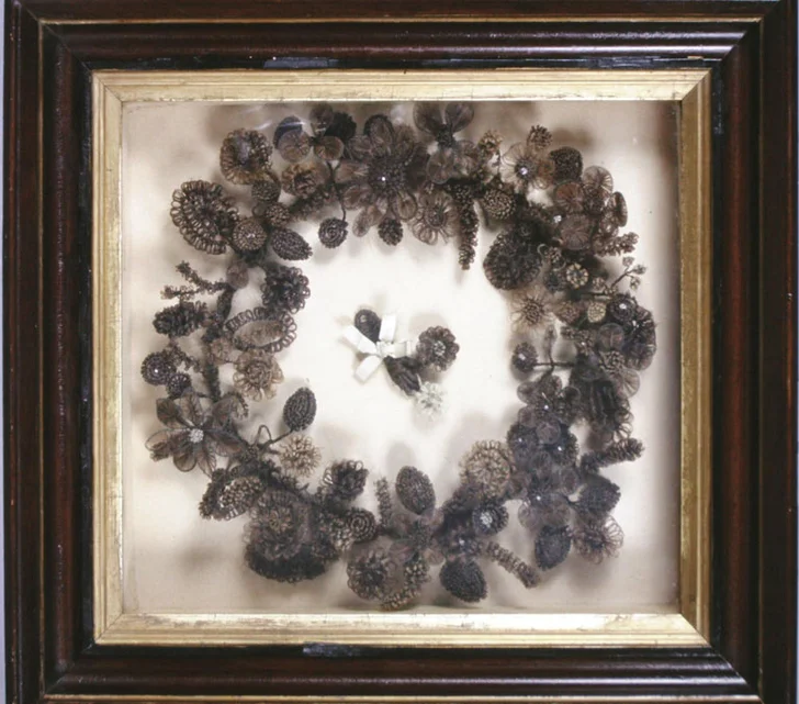Victorian hair wreath courtesy of The Children's Museum of Indianapolis and Wikimedia Commons