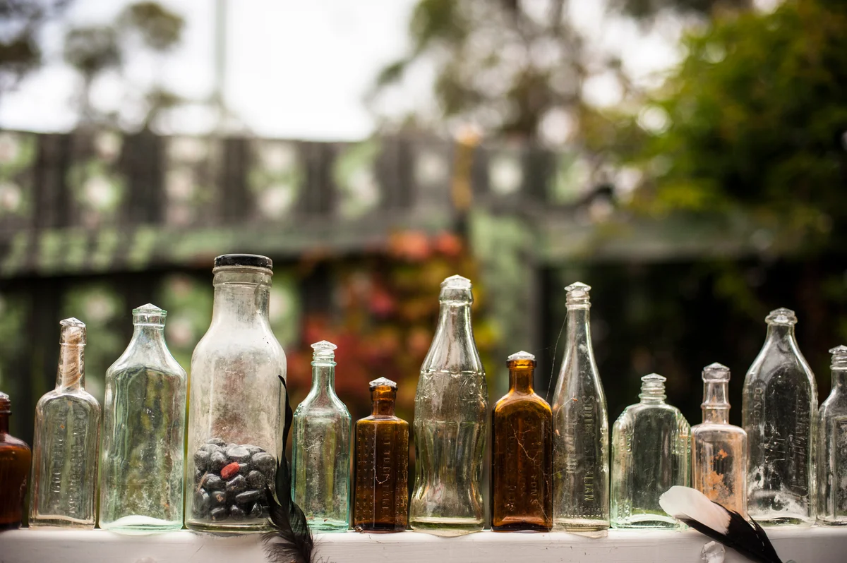 Antique and vintage colored glass medicine bottles